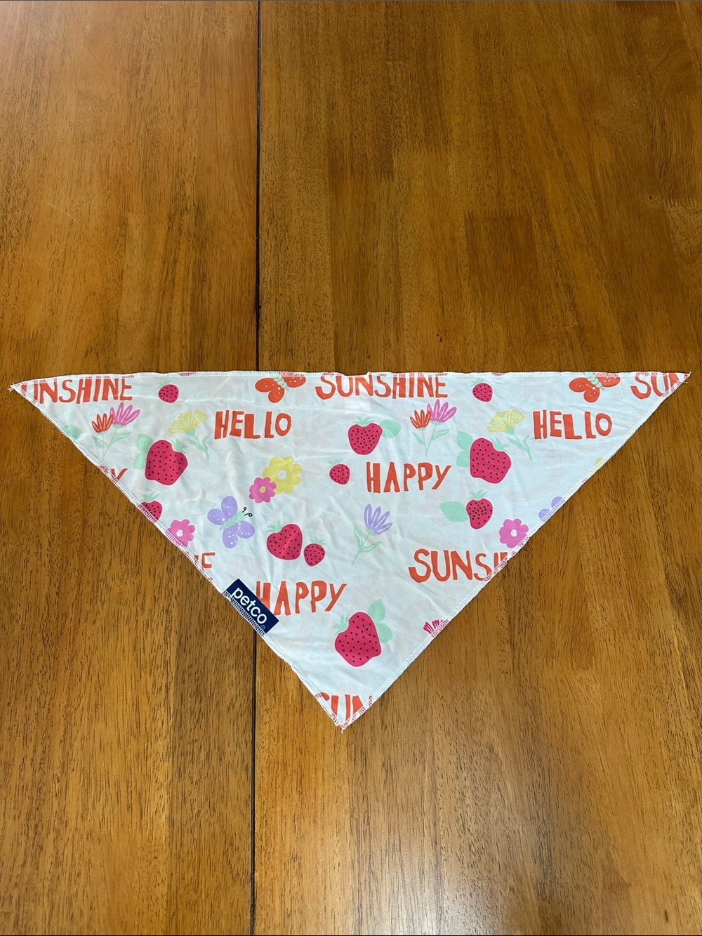 Canine scarf with butterflies strawberries and flowers. Cream background